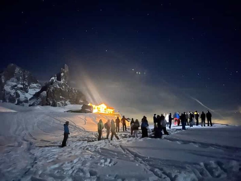 Passo Rolle : randonnée en raquettes de nuit et dîner typique du Trentin